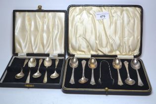 Cased set of six Birmingham silver teaspoons with tongs, together with a cased set of five silver