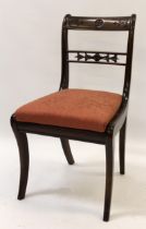 Set of fourteen 19th / 20th Century mahogany dining chairs with carved and pierced back rails,