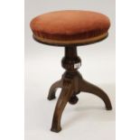 Victorian circular walnut adjustable seat piano stool on tripod support