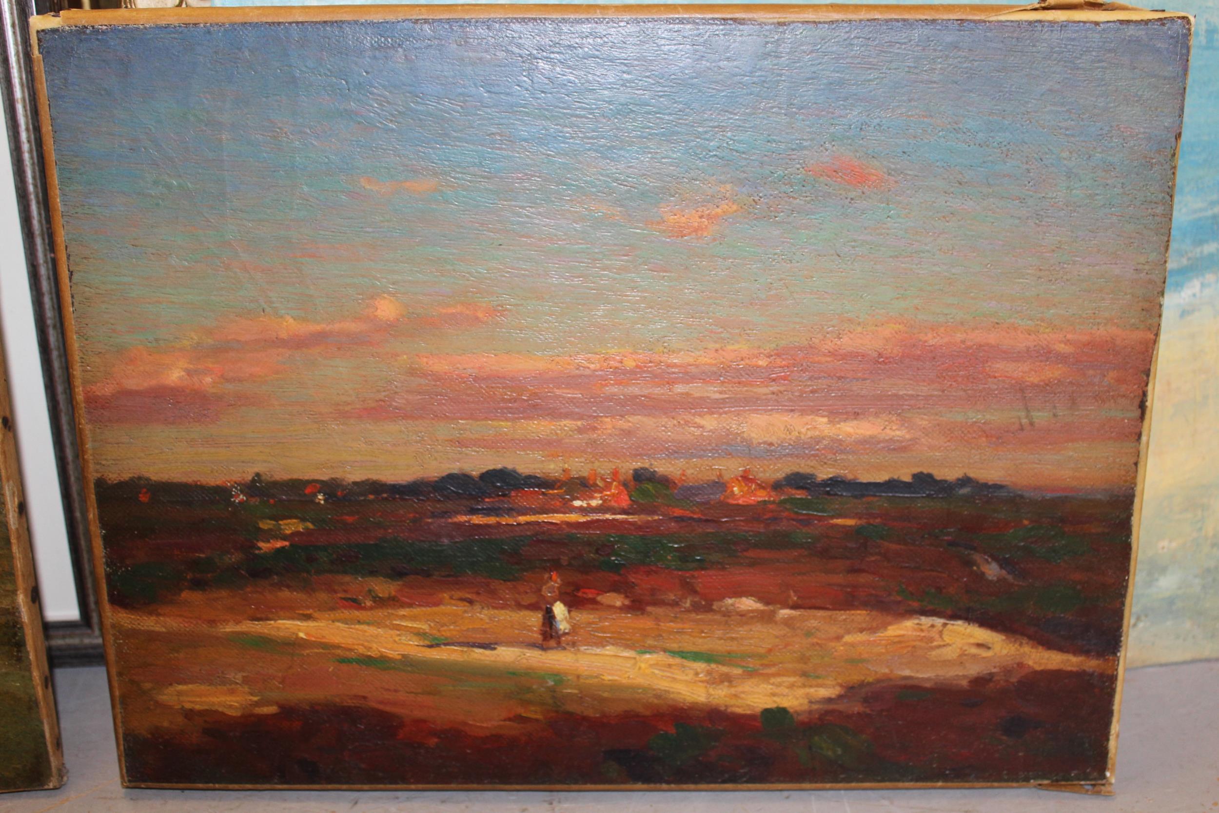 Impressionist school, oil on canvas, figure in a sunset landscape with distant cottages, 31 x