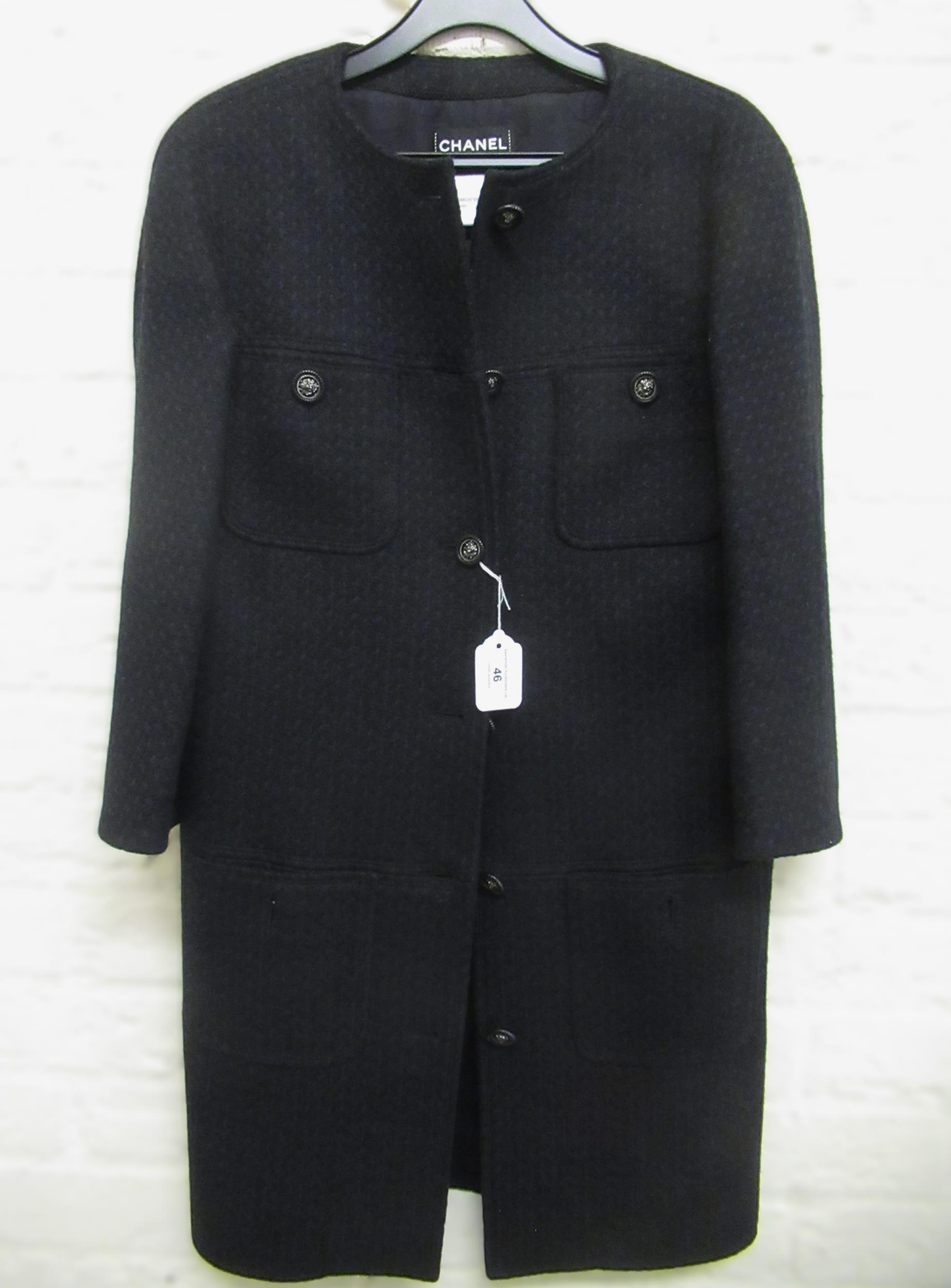 Chanel, ladies classic coat with three quarter length sleeves, size 38 Serial No. P49853v32761 In