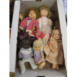Group of five various mid 20th Century composition dolls