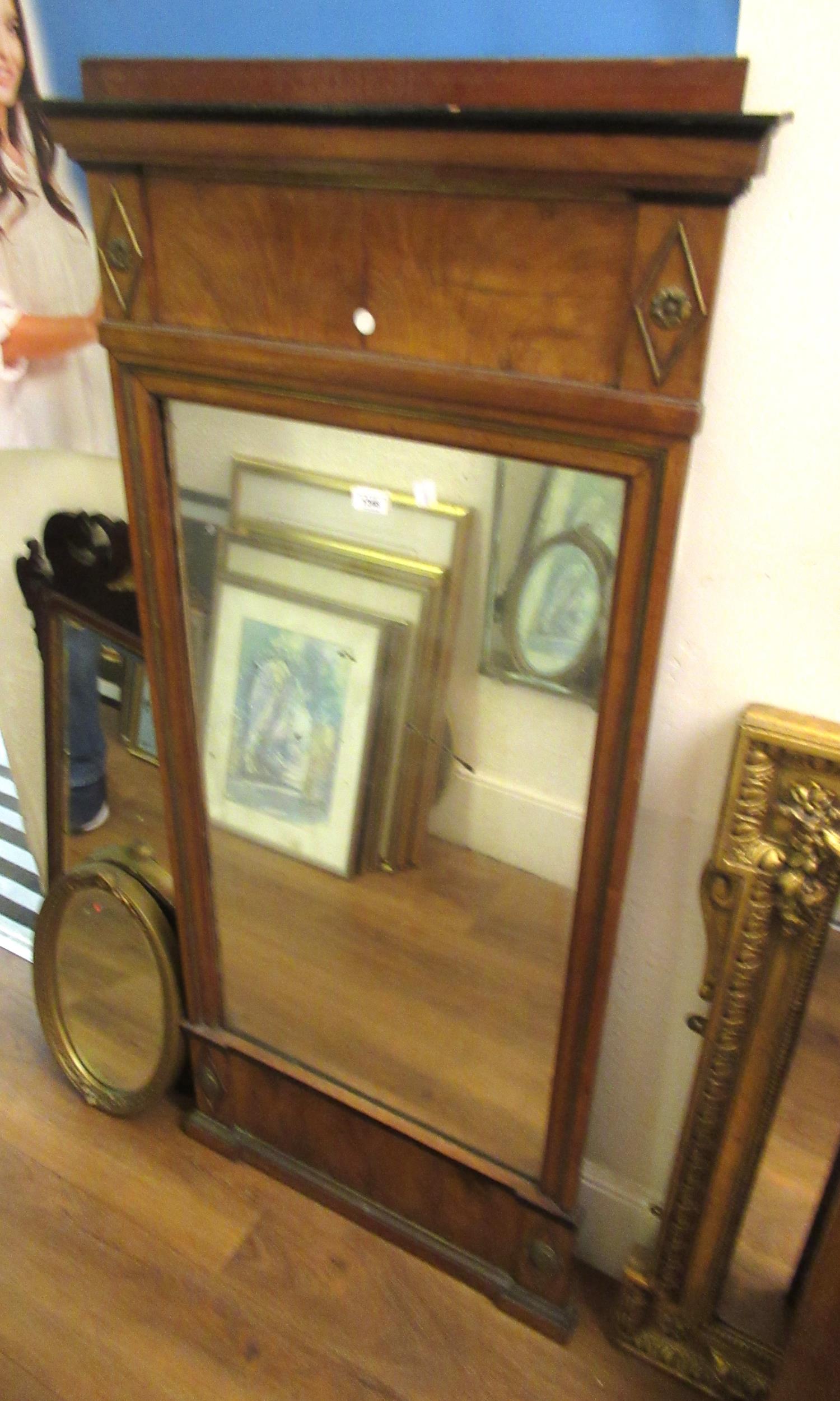 19th Century Continental mahogany and parcel gilt pier mirror, with applied gilded decoration and