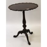 Good quality reproduction mahogany pedestal table in George III style, the shaped dish top above a