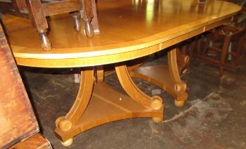 Mid to late 20th Century honey oak and sycamore crossbanded twin pedestal D-end dining table, raised