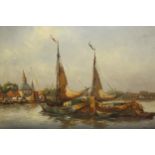 19th Century Dutch school oil on canvas, moored shipping in a canal, indistinctly signed, gilt