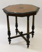 Edwards & Roberts amboyna ebonised and gilt metal mounted octagonal occasional table, on tapering