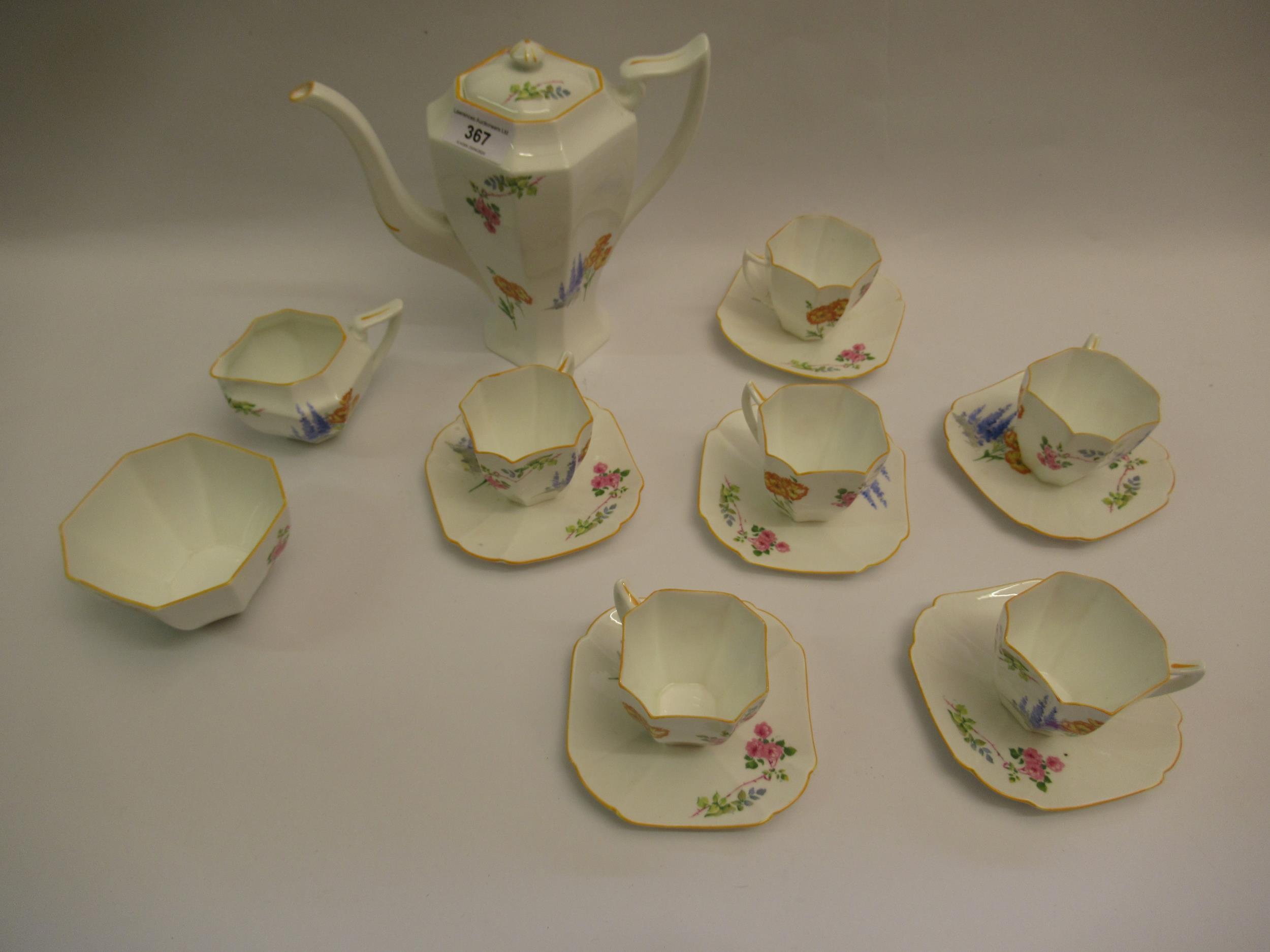 1930's Shelley fifteen piece coffee service with floral decoration small firing crack as shown in