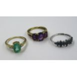 Three various 9ct gold stone set dress rings