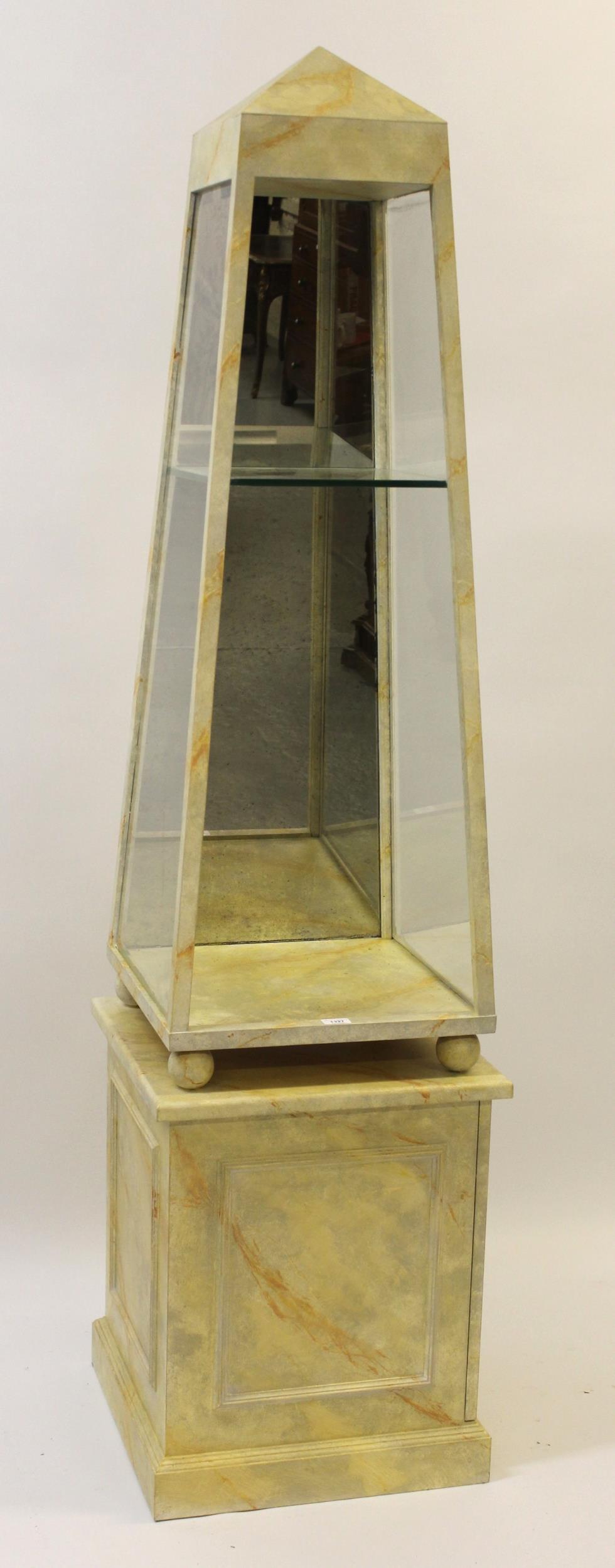 Pair of modern painted obelisk form display cabinets with plinth bases to match and marbled