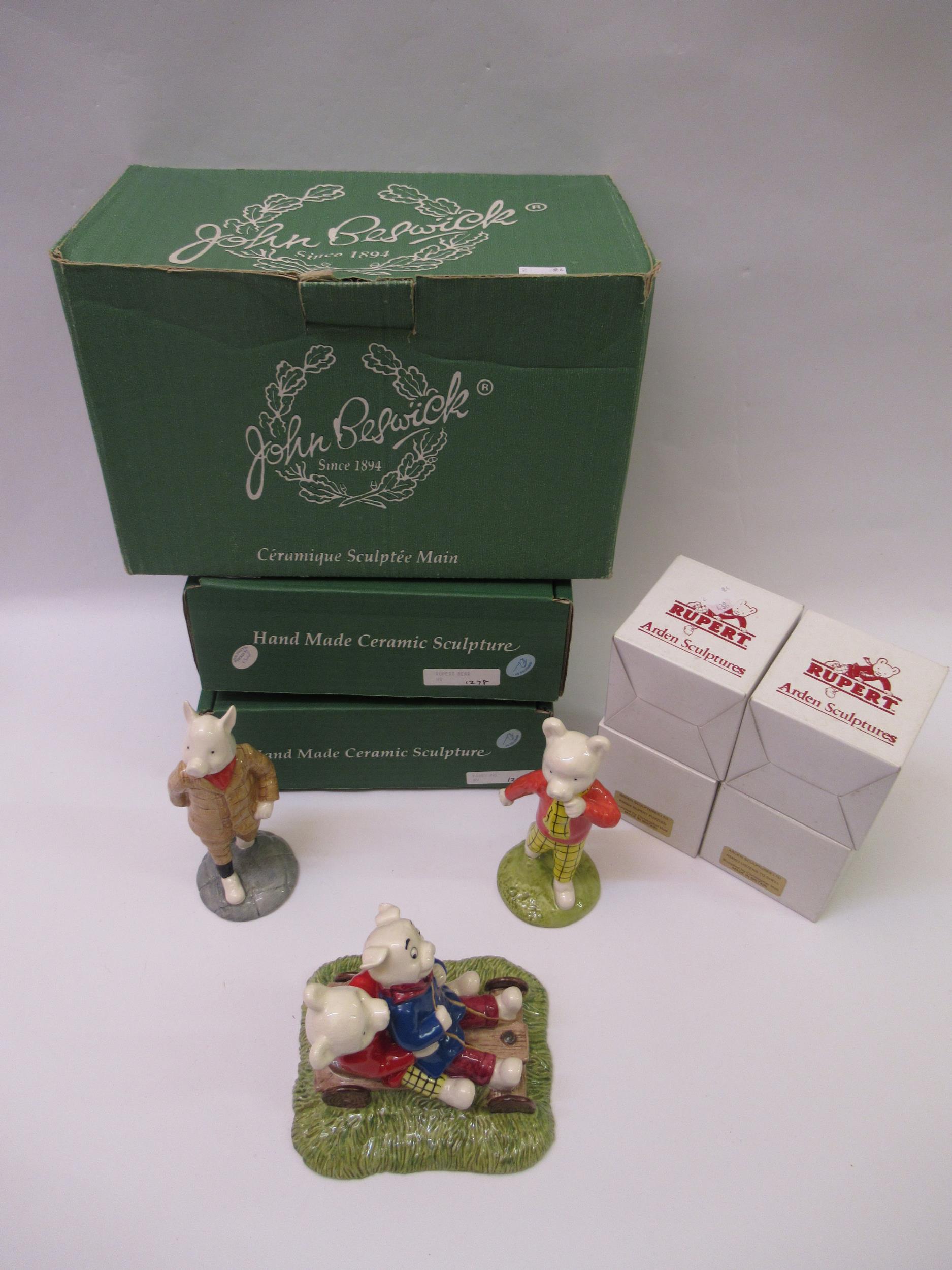 Three John Beswick ' Rupert the Bear ' figures in original boxes, together with four Arden