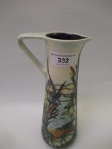 Modern Moorcroft jug with stylised floral design in a landscape, dated '98, 24cm high In good