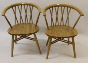 Pair of Ercol tub shaped chairs, together with a similar small desk by Made