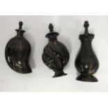 Group of three small carved horn scent bottles