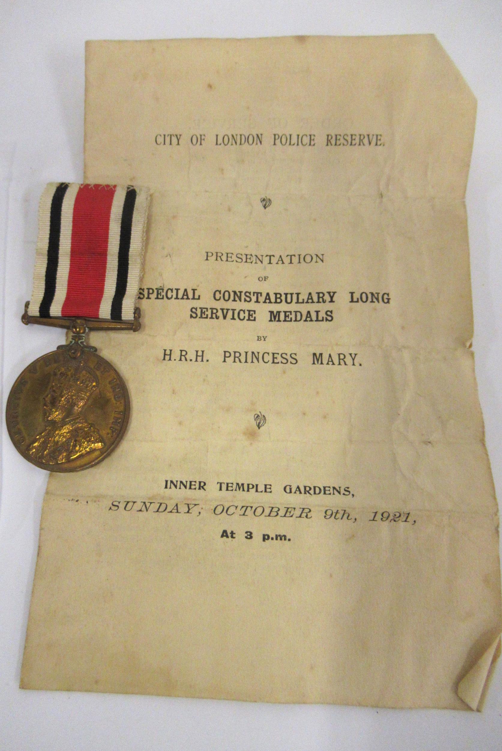 Special Constabulary Long Service medal awarded to John C. Harding, with ribbon and leaflet