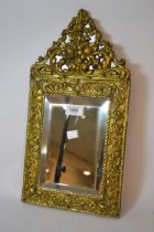 Small antique Dutch style brass wall mirror In good condition. 43cm high x 23cm wide