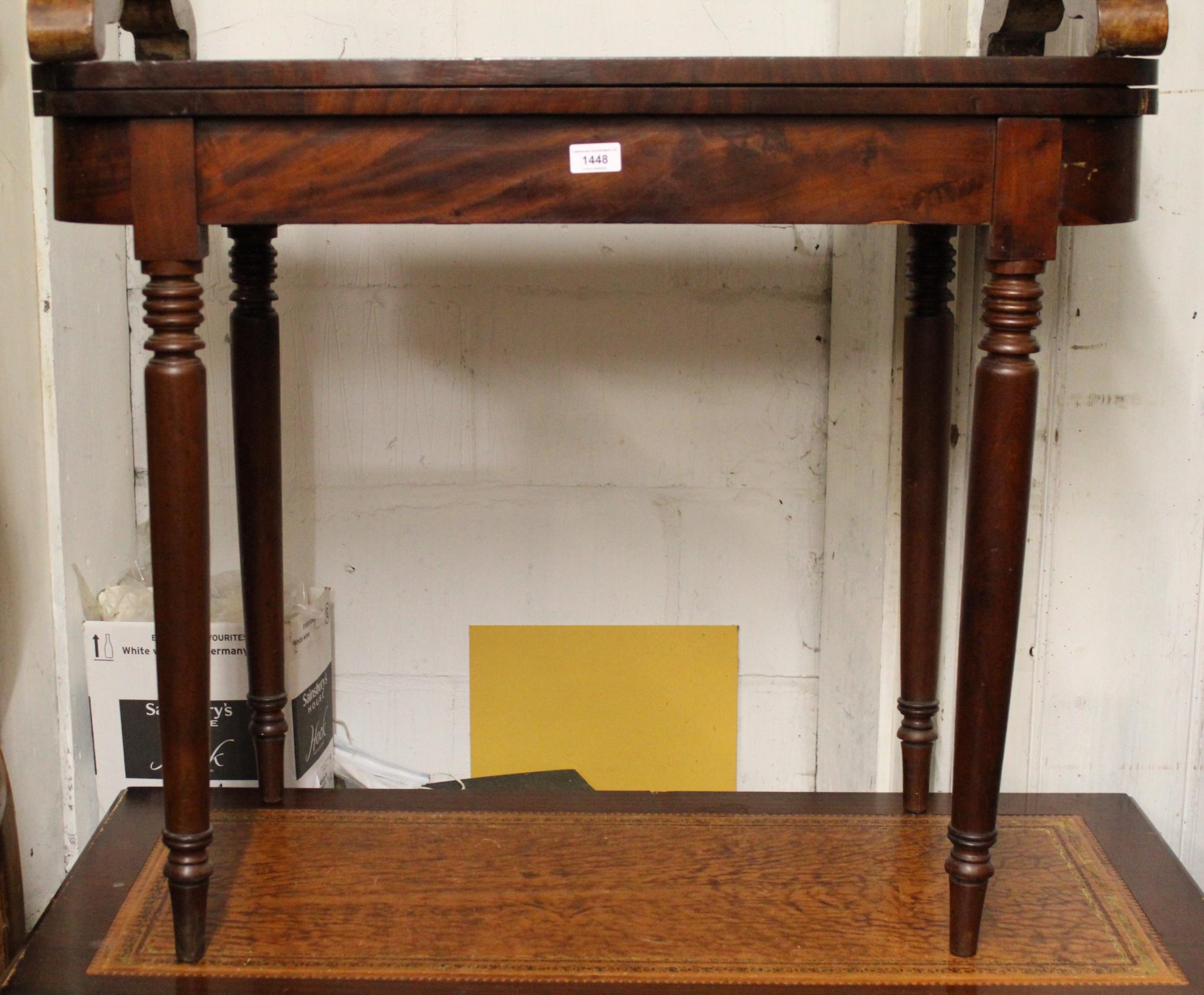 Late George III mahogany D-shaped fold-over card table, on turned tapering supports