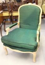 Late 20th century limed beechwood open armchair, with carved decoration, on cabriole front supports,