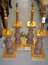 Set of four pink granite and gilt brass mounted baluster form table lamps, 70cm high excluding the