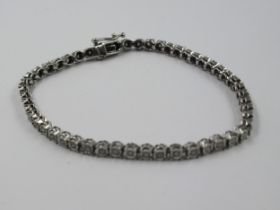 9ct White gold diamond set line bracelet. 7.3g