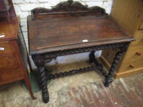 Victorian oak Davenport type desk, the galleried top with a hinged sloping writing surface above a