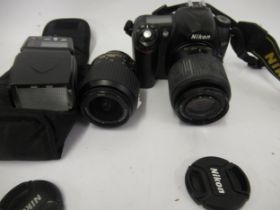 Nikon D50 camera with two lenses and accessories