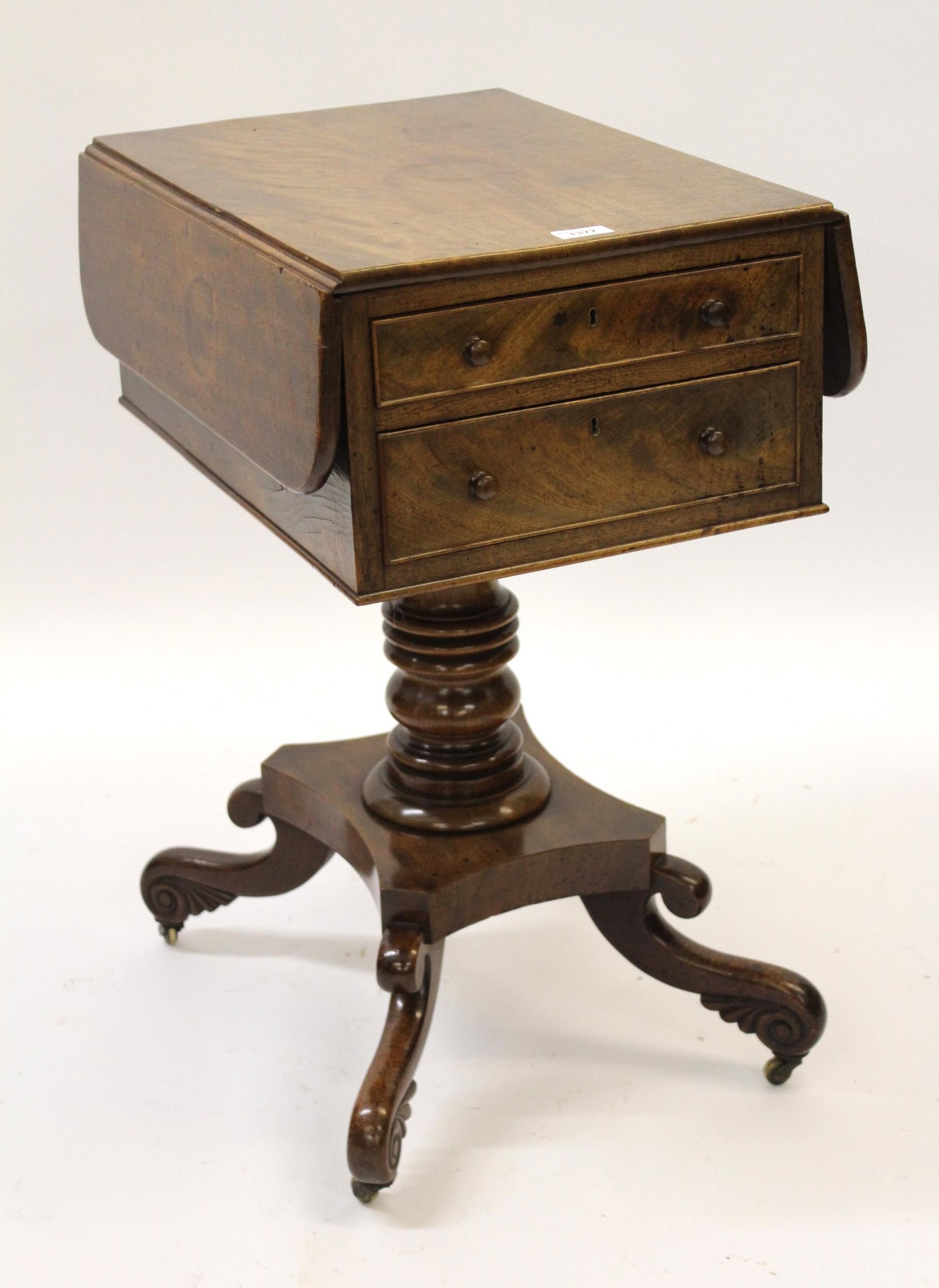 19th Century mahogany drop-leaf table having two drawers with knob handles and opposing dummy drawer