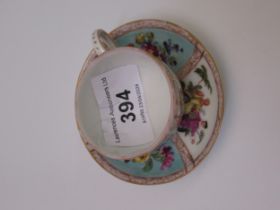 Miniature 19th Century Dresden cabinet cup and saucer decorated with panels of figures and flowers