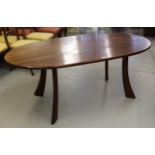 Mid 20th Century mahogany oval dining table on stylised outswept supports, 180 x 100cm approximately