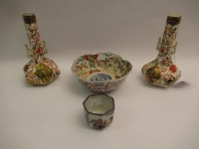 Two near matching Royal Crown Derby Imari pattern two handled faceted bottle neck vases, decorated