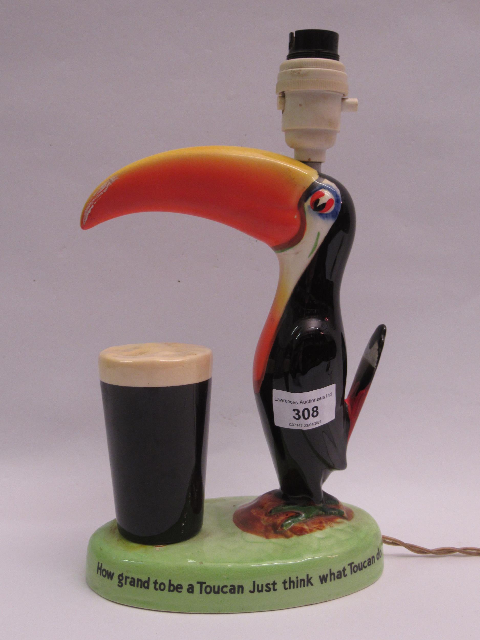 Carlton ware Guinness toucan advertising lamp, 23cm high Light does not work, would need re-wiring