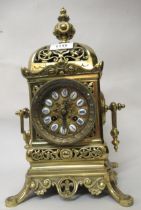 Late 19th French gilt brass mantel clock, the pierced dome shaped case with a baluster finial