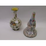 French pottery hand bell in the form of a wizard, together with an Italian pottery baluster form