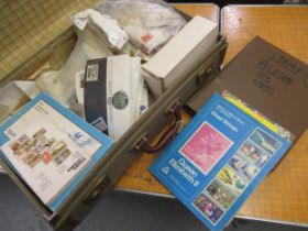 Suitcase containing quantity of stamp albums and loose stamps