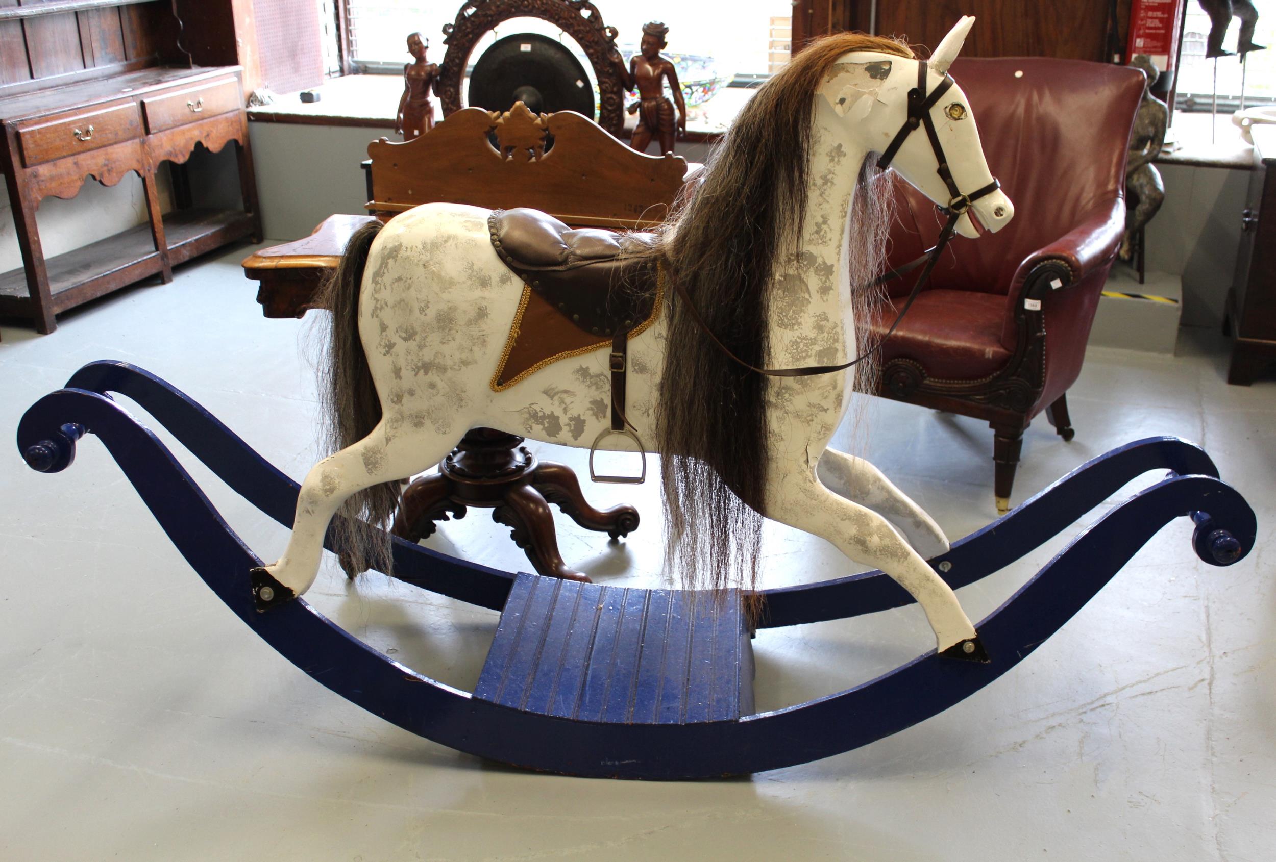 Large modern dapple grey rocking horse on blue stand (for restoration), 90cm high to saddle x