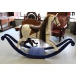 Large modern dapple grey rocking horse on blue stand (for restoration), 90cm high to saddle x