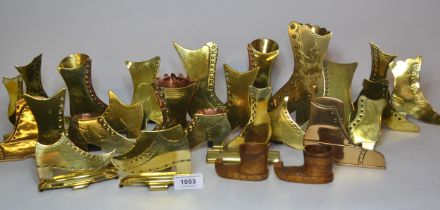 Collection of brass chimney ornaments, match holders and posy holders in the form of various boots