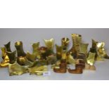 Collection of brass chimney ornaments, match holders and posy holders in the form of various boots