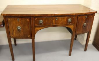 George III mahogany and line inlaid bow front sideboard, the centre drawer flanked by a cellarette