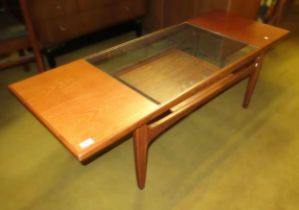 Mid 20th Century G Plan teak coffee table with glass inset top and undertier, 43cm high x 137cm long