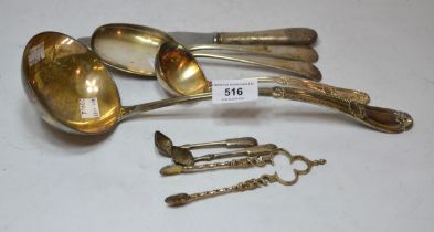 Pair of silver Apostle sugar nips, pair of silver salt spoons and a small quantity of other plated