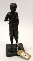 Sherree Valentine Daines, dark patinated bronze figure of a boy holding a pond yacht, No. 53 of 195,