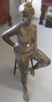 Modern dark patinated bronze figure of a seated female nude on a stool, 75cm high