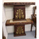 Pair of Art Deco oak metal mounted console tables with vine decorated friezes on plinth bases,