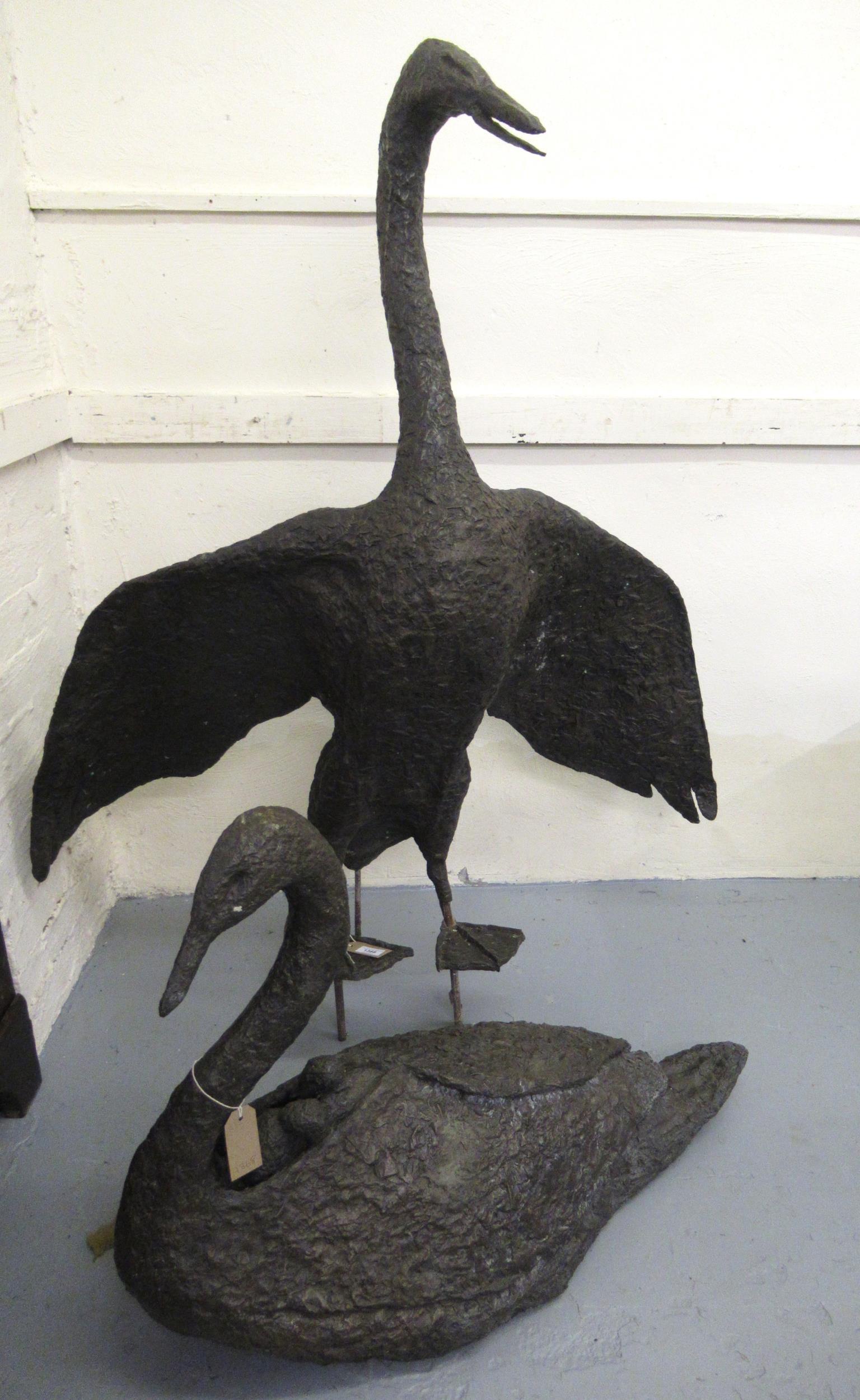 Gail Runyon Perry, pair of bronzed composition garden sculptures of male and female swans with