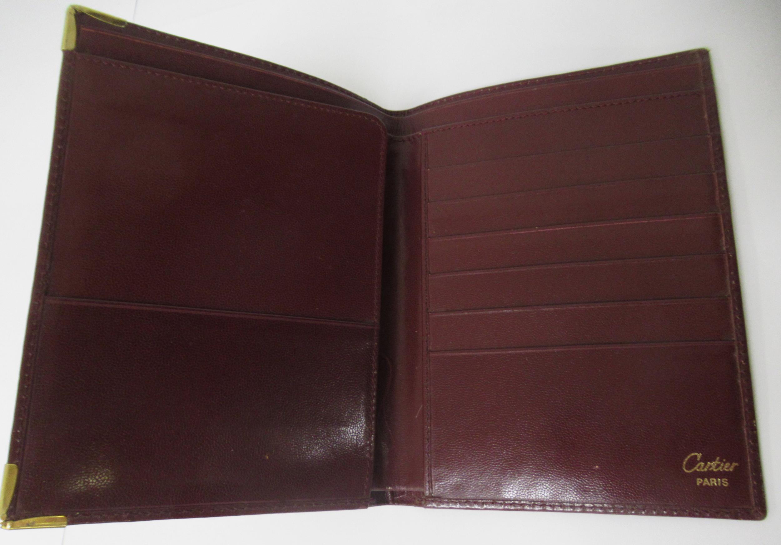 Must de Cartier, burgundy leather wallet and another burgundy wallet - Image 2 of 2