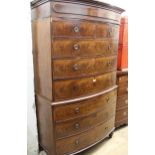 19th Century mahogany bow fronted tallboy of two short over six long graduated drawers, on turned
