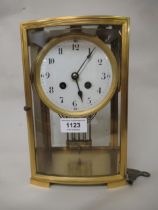 19th Century French two train clock, the circular enamel dial with Arabic numerals, striking on a