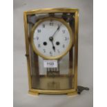 19th Century French two train clock, the circular enamel dial with Arabic numerals, striking on a