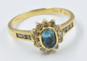 18ct Yellow gold blue topaz and diamond set ring